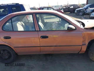 1997 Geo Prizm z VIN 1Y1SK5268VZ443044, wystawiony jako IAAI lot #41705020 z przebiegiem 94 840 mil mil oraz . Historia ofert i sprzedaży dostępna na DreamBid. Obrazek 13.