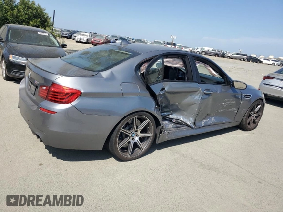 2014 BMW M5 z VIN WBSFV9C58ED593431, wystawiony jako Copart lot #54870555 z przebiegiem 172 191 mil mil oraz Szkoda całkowita • Salvage title. Historia ofert i sprzedaży dostępna na DreamBid. Obrazek 3.
