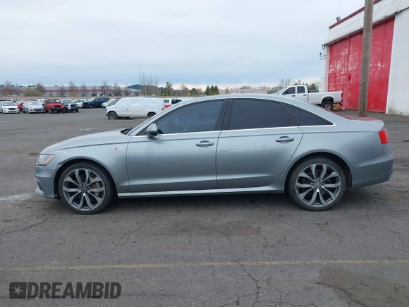2013 Audi A6 Prestige z VIN WAUHGAFC2DN009441, wystawiony jako IAAI lot #41848400 z przebiegiem 147 198 mil mil oraz . Historia ofert i sprzedaży dostępna na DreamBid. Obrazek 14.