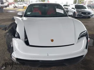 2021 Porsche Taycan z VIN WP0AA2Y19MSA19122, wystawiony jako IAAI lot #41925232 z przebiegiem 13 475 mil mil oraz . Historia ofert i sprzedaży dostępna na DreamBid. Obrazek 6.