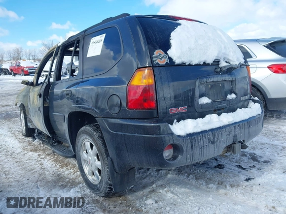 2004 GMC Envoy SLE with VIN 1GKDT13S242426816, listed as a IAAI auction lot 41566269 with 1 mi miles. Bid and sale history available at carsss.com. Image 3.