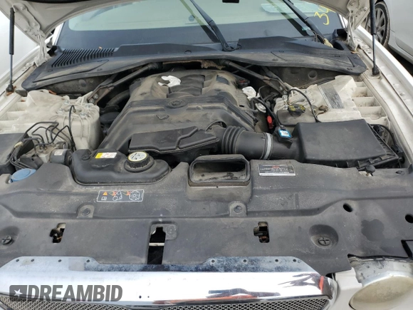 2004 Jaguar XJ with VIN SAJWA71C44SG34094, listed as a Copart auction lot 74969004 with 0 mi miles and Salvage Title. Bid and sale history available at carsss.com. Image 11.