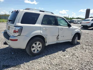 2010 Mercury Mariner with VIN 4M2CN8B78AKJ00919, listed as a Copart auction lot 64988364 with 0 mi miles and Salvage Title. Bid and sale history available at carsss.com. Image 3.