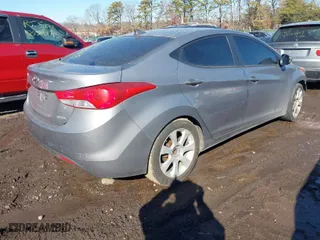 2012 Hyundai Elantra GLS PZEV with VIN KMHDH4AEXCU351759, listed as a IAAI auction lot 41679662 with 999,999 mi miles. Bid and sale history available at carsss.com. Image 4.