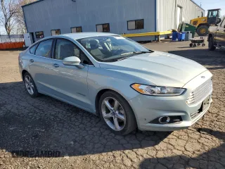 2014 Ford Fusion SE Hybrid with VIN 3FA6P0LU6ER185155, listed as a Copart auction lot 47108025 with 73,616 mi miles and Salvage title. Bid and sale history available at DreamBid. Image 4.