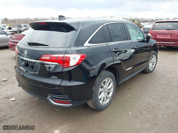 2017 Acura RDX w/Technology Pkg with VIN 5J8TB4H59HL020418, listed as a IAAI auction lot 41560828 with 102,545 mi miles. Bid and sale history available at carsss.com. Image 4.