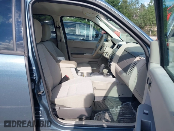 2011 Ford Escape Hybrid z VIN 1FMCU5K37BKB86287, wystawiony jako IAAI lot #42683149 z przebiegiem 151 972 mil mil oraz . Historia ofert i sprzedaży dostępna na DreamBid. Obrazek 5.