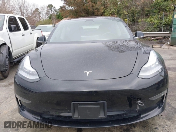 2019 Tesla Model 3 Mid Range with VIN 5YJ3E1EA3KF313425, listed as a IAAI auction lot 41806388 with 110,767 mi miles and . Bid and sale history available at carsss.com. Image 12.