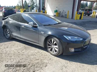 2014 Tesla Model S 60 with VIN 5YJSA1H19EFP45024, listed as a IAAI auction lot 41960222 with 108,573 mi miles and . Bid and sale history available at DreamBid. Image 1.