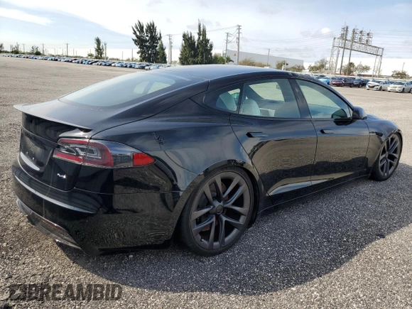 2022 Tesla Model S Plaid z VIN 5YJSA1E64NF461218, wystawiony jako Copart lot #84467644 z przebiegiem Nie podano mil oraz Szkoda całkowita • Salvage title. Historia ofert i sprzedaży dostępna na DreamBid. Obrazek 3.