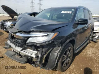 2019 Honda Pilot Touring 8-Passenger with VIN 5FNYF6H91KB005381, listed as a Copart auction lot 59770675 with 61,918 mi miles and Salvage title. Bid and sale history available at DreamBid. Image 1.