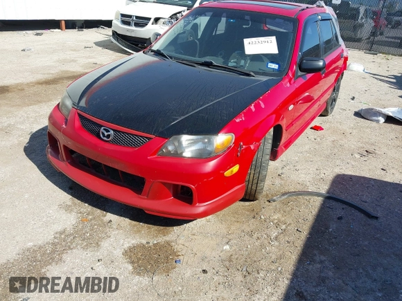 2002 Mazda Protege z VIN JM1BJ245221631014, wystawiony jako IAAI lot #42232912 z przebiegiem 180 184 mil mil oraz . Historia ofert i sprzedaży dostępna na DreamBid. Obrazek 16.