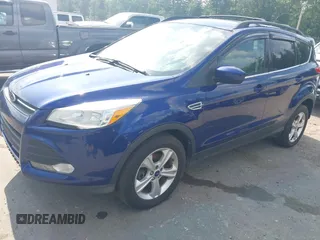 2013 Ford Escape SE with VIN 1FMCU9GX9DUD30349, listed as a IAAI auction lot 42572201 with 148,765 mi miles and . Bid and sale history available at DreamBid. Image 2.