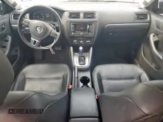 2014 Volkswagen Jetta TDI w/Premium/Nav with VIN 3VWLL7AJ7EM385112, listed as a Copart auction lot 58063295 with 169,683 mi miles and Salvage title. Bid and sale history available at DreamBid. Image 8.