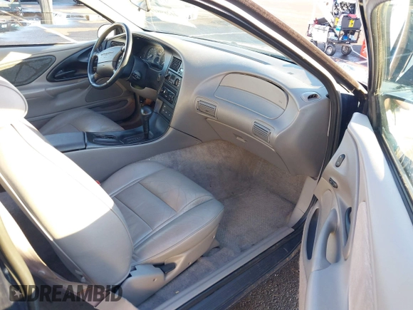 1996 Ford Thunderbird LX z VIN 1FALP62W1TH100925, wystawiony jako IAAI lot #41289811 z przebiegiem 84 056 mil mil oraz . Historia ofert i sprzedaży dostępna na DreamBid. Obrazek 5.