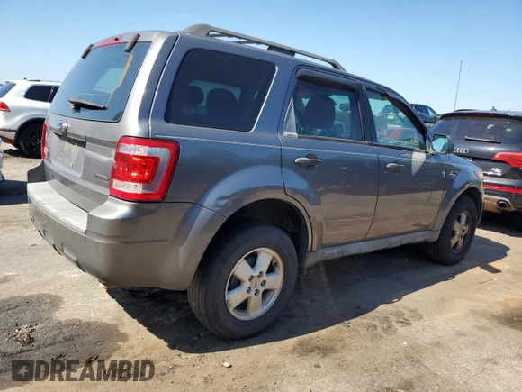 2009 Ford Escape XLS with VIN 1FMCU02749KA36136, listed as a Copart auction lot 64941875 with 171,576 mi miles and Clean title. Bid and sale history available at DreamBid. Image 3.