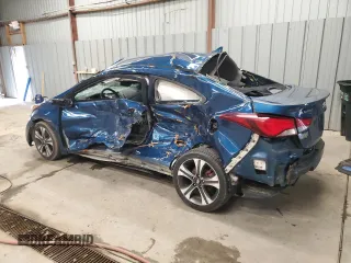 2014 Hyundai Elantra Coupe with VIN KMHDH6AH4EU028624, listed as a Copart auction lot 56992494 with 0 mi miles and Salvage Title. Bid and sale history available at carsss.com. Image 2.