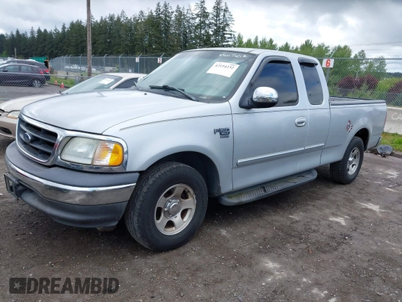 2002 Ford F-150 z VIN 2FTRX17L42CA98695, wystawiony jako IAAI lot #42154232 z przebiegiem 180 924 mil mil oraz . Historia ofert i sprzedaży dostępna na DreamBid. Obrazek 2.