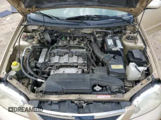 2001 Mazda Protege LX with VIN JM1BJ225810473897, listed as a Copart auction lot 52192045 with 145,839 mi miles and Salvage Title. Bid and sale history available at carsss.com. Image 12.