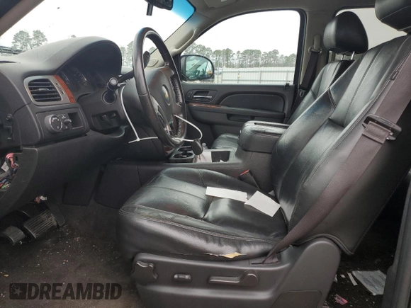 2014 Chevrolet Suburban LT with VIN 1GNSCJE05ER138819, listed as a Copart auction lot 43324175 with 218,114 mi miles and Salvage Title. Bid and sale history available at carsss.com. Image 7.
