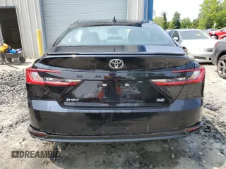 2025 Toyota Camry LE z VIN 4T1DAACKXSU089259, wystawiony jako Copart lot #59180765 z przebiegiem 9 242 mil mil oraz Czysty tytuł • Clean title. Historia ofert i sprzedaży dostępna na DreamBid. Obrazek 6.