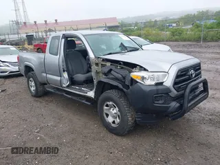 2017 Toyota Tacoma SR z VIN 5TFSX5EN2HX054134, wystawiony jako IAAI lot #42351829 z przebiegiem 98 592 mil mil oraz . Historia ofert i sprzedaży dostępna na DreamBid. Obrazek 1.