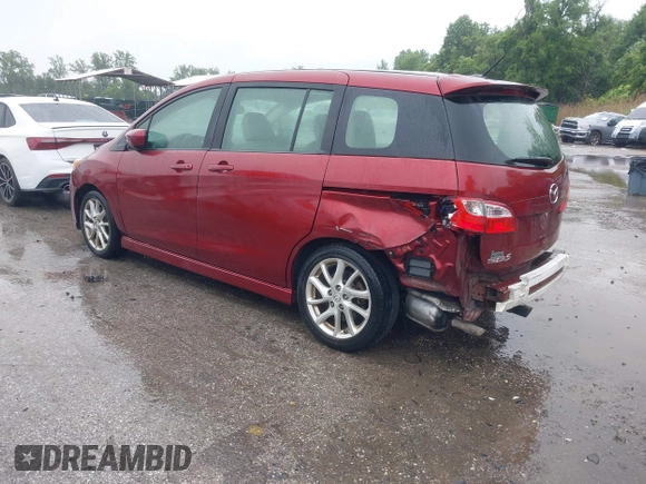 2012 Mazda 5 Grand Touring with VIN JM1CW2DL8C0142628, listed as a IAAI auction lot 42350676 with 84,764 mi miles and . Bid and sale history available at DreamBid. Image 3.