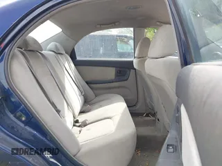 2006 Kia Spectra EX with VIN KNAFE122965293874, listed as a IAAI auction lot 42111219 with 241,644 mi miles. Bid and sale history available at carsss.com. Image 8.