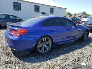 2016 BMW M6 z VIN WBS6E9C56GGF92508, wystawiony jako Copart lot #66958344 z przebiegiem Nie podano mil oraz Szkoda całkowita • Salvage title. Historia ofert i sprzedaży dostępna na DreamBid. Obrazek 3.