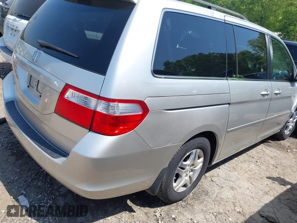 2007 Honda Odyssey EX-L z VIN 5FNRL38667B453060, wystawiony jako IAAI lot #42066637 z przebiegiem 184 439 mil mil oraz . Historia ofert i sprzedaży dostępna na DreamBid. Obrazek 4.
