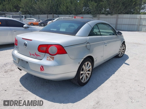 2008 Volkswagen Eos Turbo z VIN WVWBA71F58V030188, wystawiony jako IAAI lot #42040441 z przebiegiem 150 976 mil mil oraz . Historia ofert i sprzedaży dostępna na DreamBid. Obrazek 4.