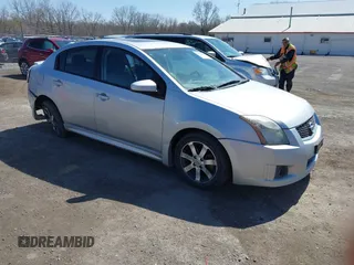 2012 Nissan Sentra S z VIN 3N1AB6APXCL668332, wystawiony jako IAAI lot #41929923 z przebiegiem 123 073 mil mil oraz . Historia ofert i sprzedaży dostępna na DreamBid. Obrazek 1.