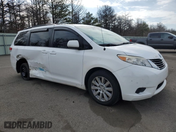 2012 Toyota Sienna LE with VIN 5TDJK3DC5CS040337, listed as a Copart auction lot 50701935 with 201,024 mi miles and Salvage Title. Bid and sale history available at carsss.com. Image 4.
