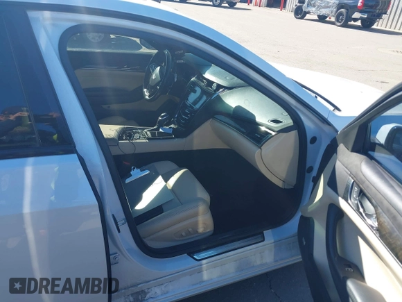 2017 Cadillac CTS Luxury AWD with VIN 1G6AX5SS8H0140131, listed as a IAAI auction lot 41675292 with 125,903 mi miles and . Bid and sale history available at DreamBid. Image 5.