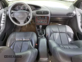 1999 Chrysler Cirrus LXi z VIN 1C3EJ56H4XN640016, wystawiony jako Copart lot #65498464 z przebiegiem 82 149 mil mil oraz Tytuł czysty. Historia ofert i sprzedaży dostępna na DreamBid. Obrazek 8.
