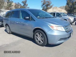 2012 Honda Odyssey EX-L with VIN 5FNRL5H69CB003067, listed as a IAAI auction lot 41862591 with 163,158 mi miles and . Bid and sale history available at carsss.com. Image 1.