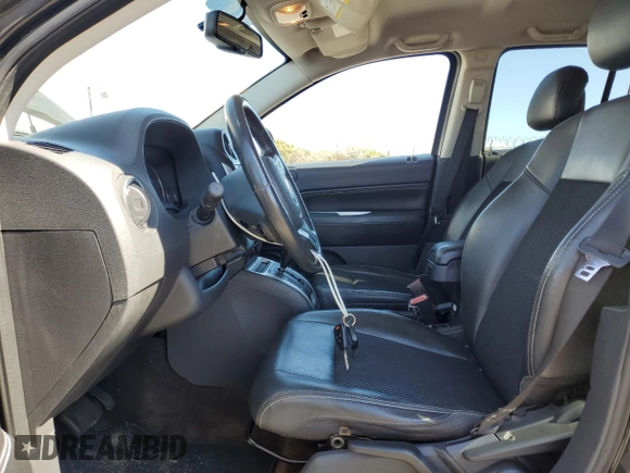 2014 Jeep Compass High Altitude with VIN 1C4NJCEA0ED529504, listed as a Copart auction lot 42349445 with 90,705 mi miles and Clean Title. Bid and sale history available at carsss.com. Image 7.