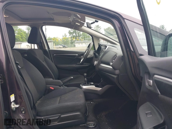 2015 Honda Fit EX z VIN 3HGGK5G80FM751625, wystawiony jako IAAI lot #42427480 z przebiegiem 109 657 mil mil oraz . Historia ofert i sprzedaży dostępna na DreamBid. Obrazek 5.