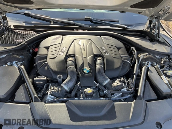 2017 BMW 7 Series 750i с VIN WBA7F0C31HGM21647, выставлен на аукционе Copart как лот 48763345 с пробегом 27 590 миль миль и Чистый • Clean title. История ставок и продаж доступна на DreamBid. Изображение 7.