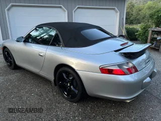 2004 Porsche 911 Carrera z VIN WP0CA299X4S651377, wystawiony jako Copart lot #60941235 z przebiegiem 139 410 mil mil oraz Szkoda całkowita • Salvage title. Historia ofert i sprzedaży dostępna na DreamBid. Obrazek 3.