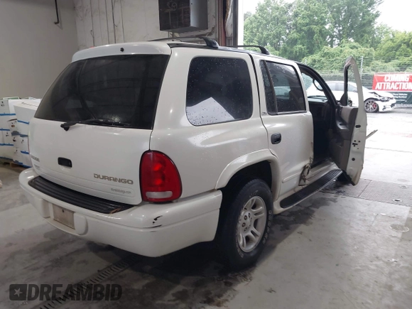 2002 Dodge Durango z VIN 1B4HR48N72F144237, wystawiony jako IAAI lot #42242043 z przebiegiem 72 065 mil mil oraz . Historia ofert i sprzedaży dostępna na DreamBid. Obrazek 4.