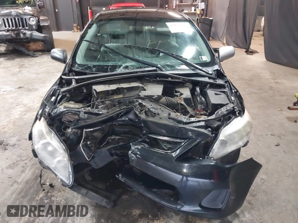 2013 Toyota Corolla L with VIN 2T1BU4EE9DC094853, listed as a IAAI auction lot 41934735 with 122,463 mi miles and . Bid and sale history available at DreamBid. Image 6.