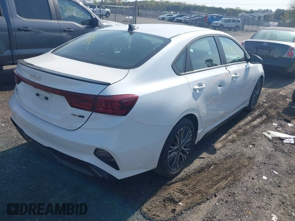 2023 Kia Forte GT-Line with VIN 3KPF54AD5PE563311, listed as a IAAI auction lot 42028015 with 54,900 mi miles. Bid and sale history available at carsss.com. Image 4.