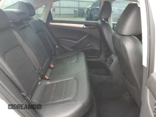 2013 Volkswagen Passat SE z VIN 1VWBP7A36DC140948, wystawiony jako Copart lot #59081705 z przebiegiem 139 320 mil mil oraz Szkoda całkowita • Salvage title. Historia ofert i sprzedaży dostępna na DreamBid. Obrazek 11.
