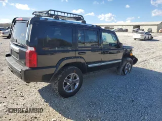 2007 Jeep Commander Overland with VIN 1J8HG68207C610814, listed as a Copart auction lot 41726555 with 211,502 mi miles and Salvage title. Bid and sale history available at DreamBid. Image 3.