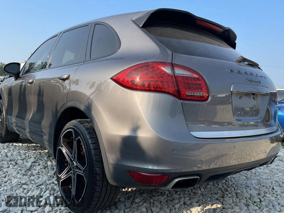 2011 Porsche Cayenne S with VIN WP1AB2A22BLA47332, listed as a Copart auction lot 65087385 with 112,033 mi miles and Salvage title. Bid and sale history available at DreamBid. Image 3.