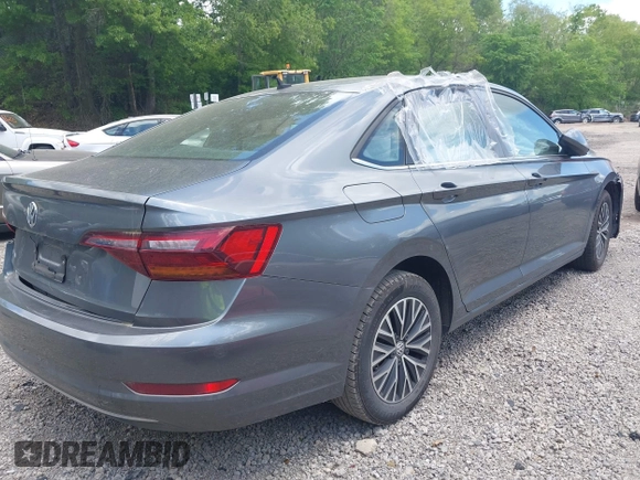 2019 Volkswagen Jetta S z VIN 3VWC57BUXKM121316, wystawiony jako IAAI lot #42290107 z przebiegiem 117 371 mil mil oraz . Historia ofert i sprzedaży dostępna na DreamBid. Obrazek 4.