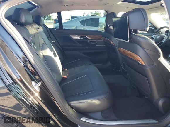 2017 BMW 7 Series 740i xDrive with VIN WBA7E4C34HGU99964, listed as a Copart auction lot 69808464 with 93,423 mi miles and Non Repairable. Bid and sale history available at carsss.com. Image 10.