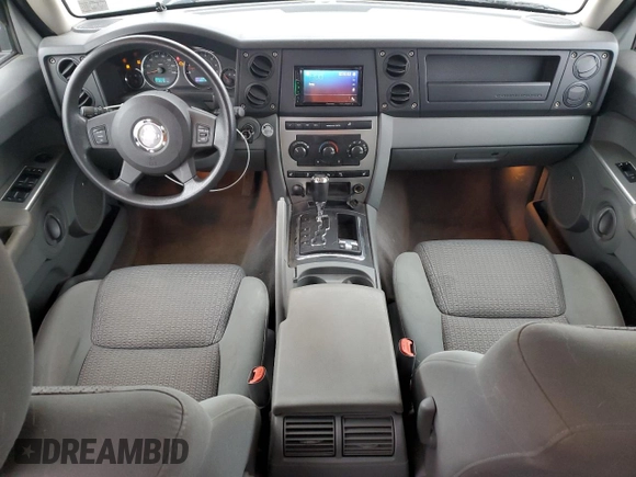 2007 Jeep Commander Sport z VIN 1J8HG48P97C622153, wystawiony jako Copart lot #50291165 z przebiegiem 113 516 mil mil oraz Szkoda całkowita • Salvage title. Historia ofert i sprzedaży dostępna na DreamBid. Obrazek 8.