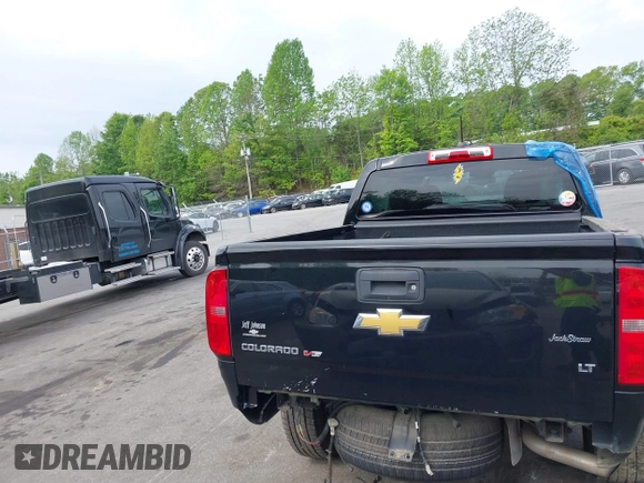 2020 Chevrolet Colorado 4WD LT with VIN 1GCGTCEN6L1189568, listed as a IAAI auction lot 42097979 with 64,919 mi miles and . Bid and sale history available at DreamBid. Image 16.